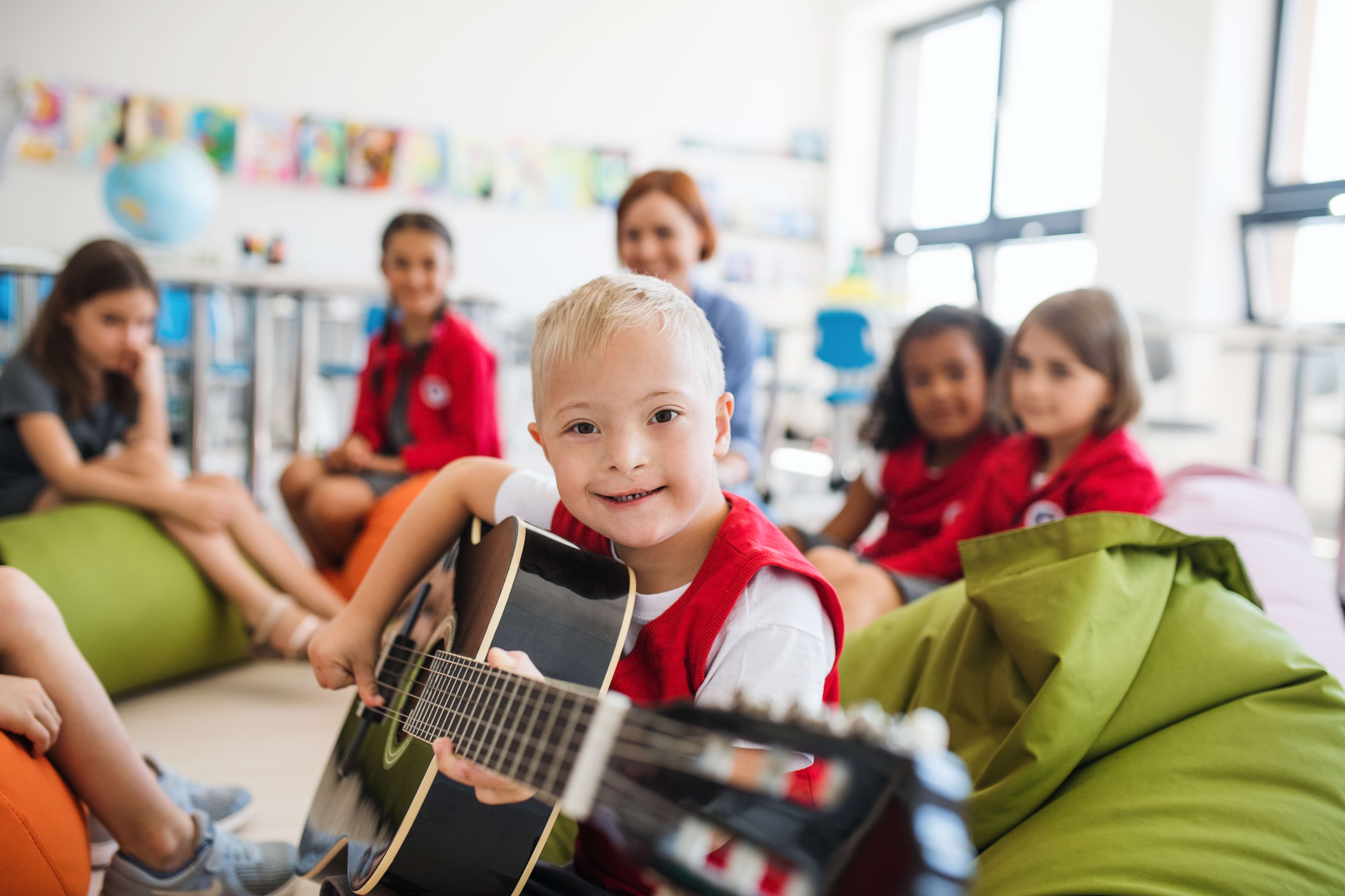 Happy diverse school kids - children in educational setting